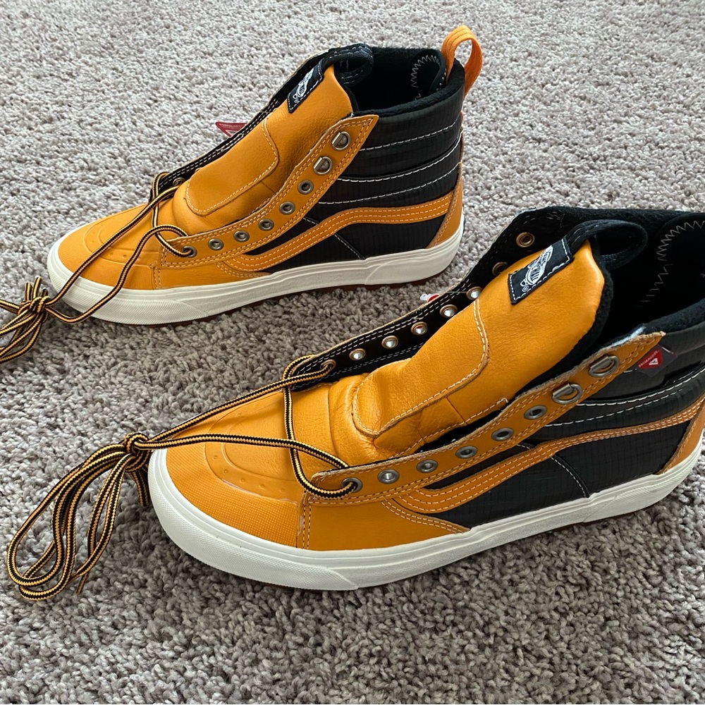 Vans Yellow and Black High-Top Sneakers with Classic Design